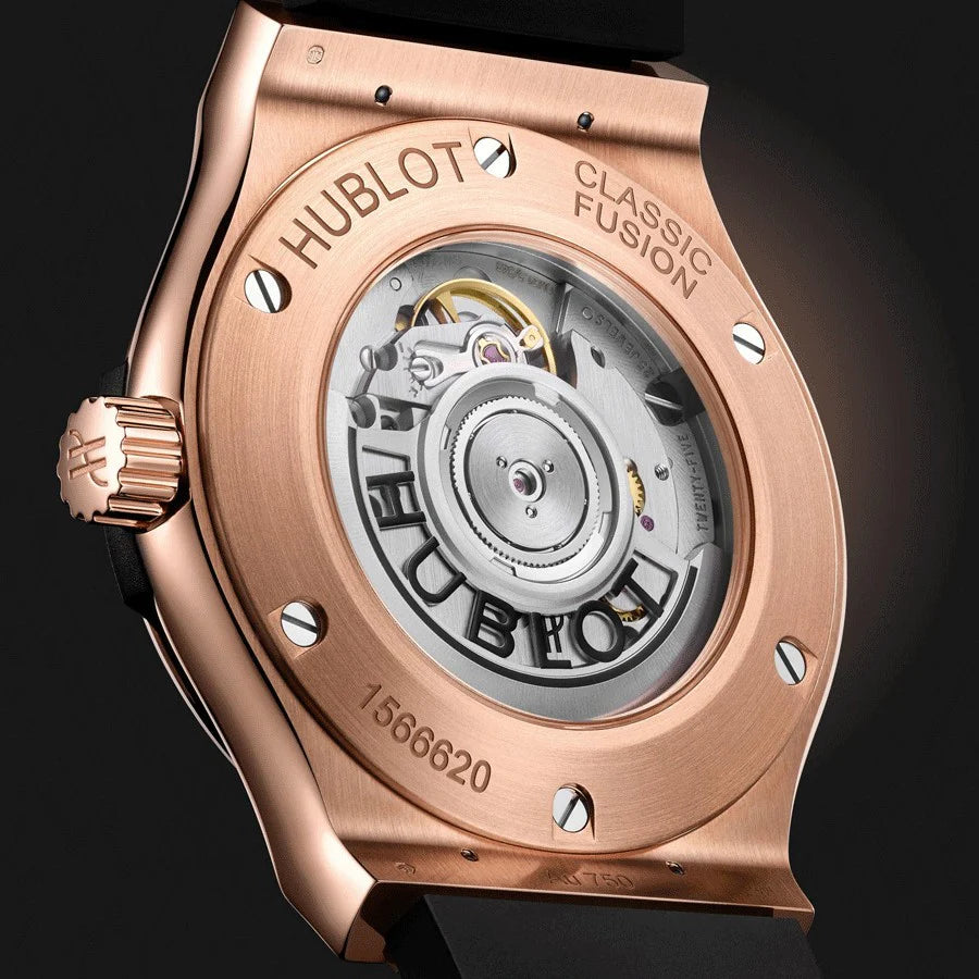 Montre Hublot Classic Fusion King Gold automatique cadran noir bracelet caoutchouc noir 42 mm